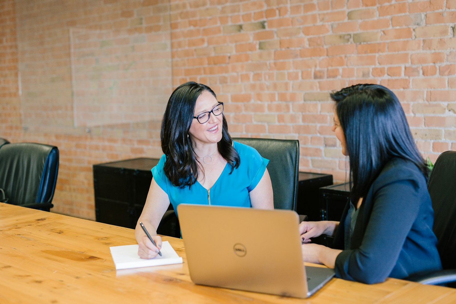 An advisor answering a client’s questions during a consultation